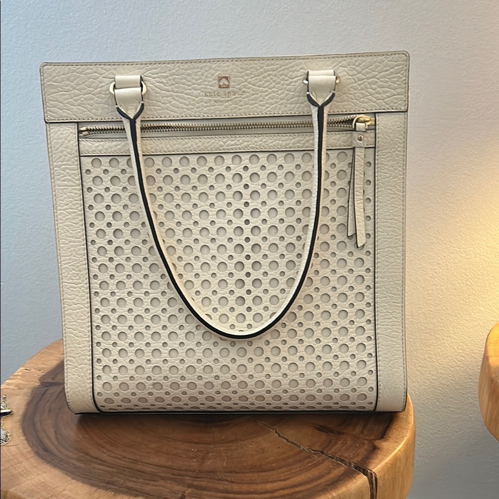 Kate Spade Cream Tote Bag with Intricate Circular Cut Out Pattern